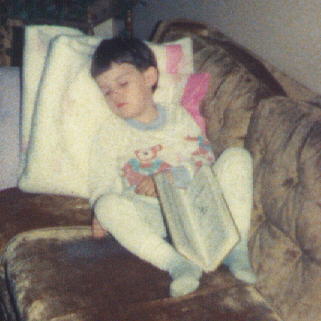 Reading a book.... 4 or 5 years old